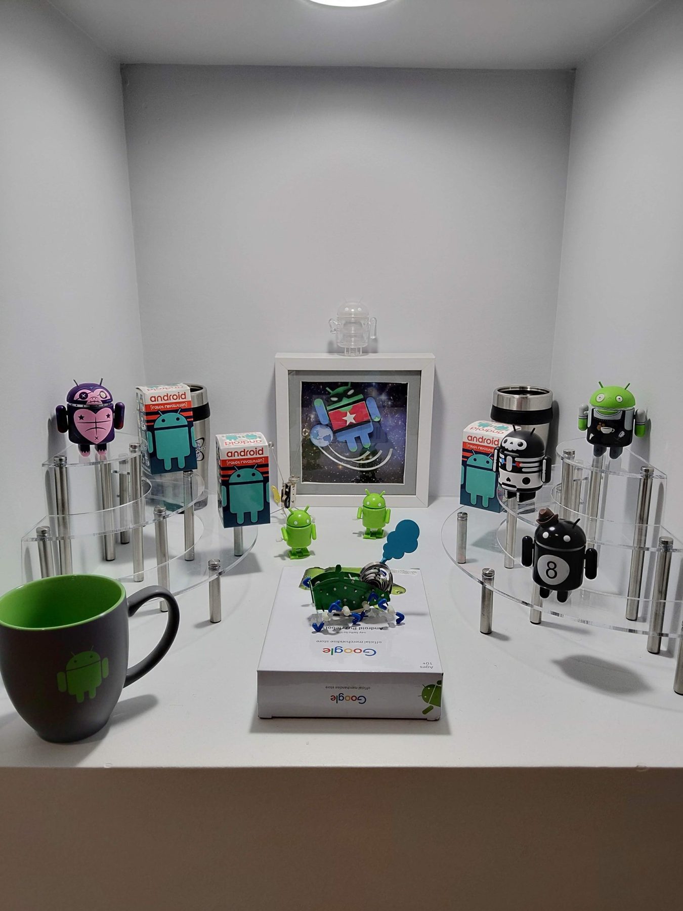 Android collectibles shelf in the Mica Specialties office